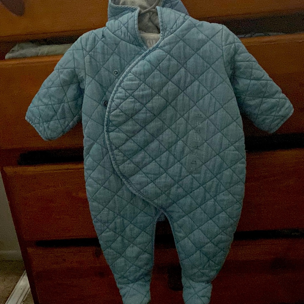 Brand new with tag. Thick one piece with hood and footed